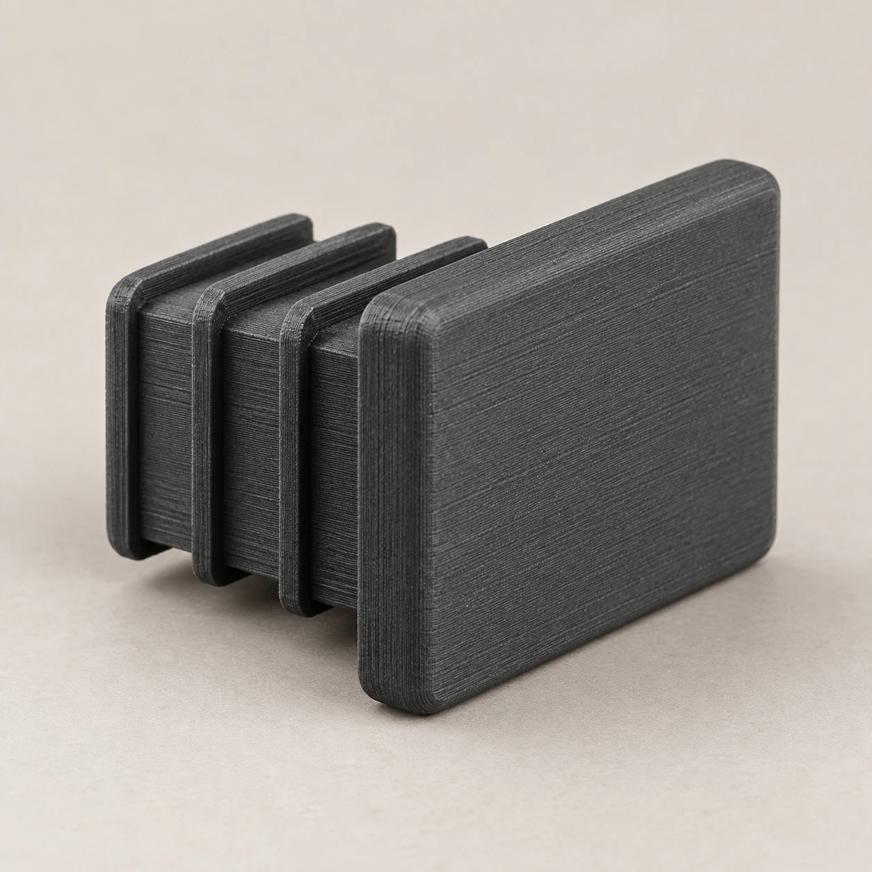 Bouchon de tube rectangulaire à ailettes
