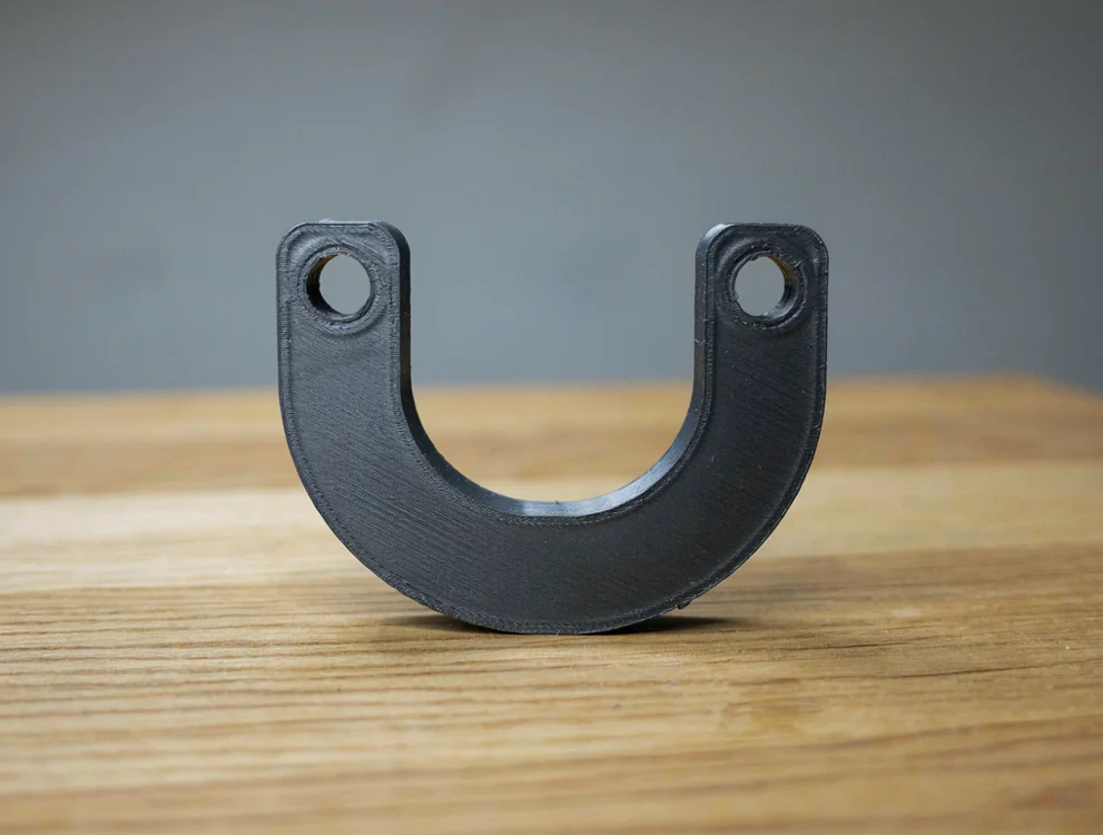 Étrier de maintien de faisceau