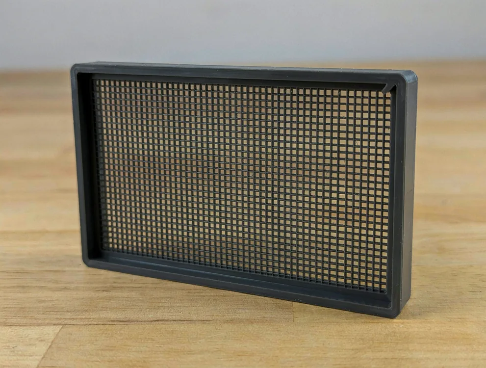 Filtre-support de hotte aspirante