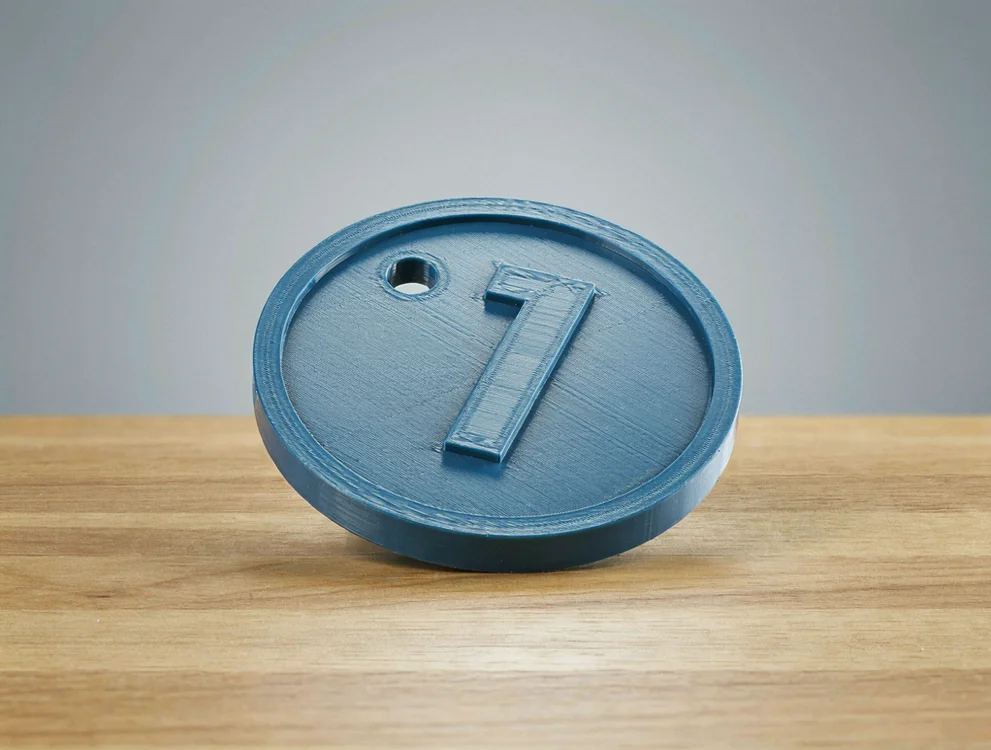 Jeton de vestiaire numéroté