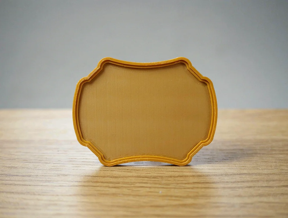 Médaille à contour découpé