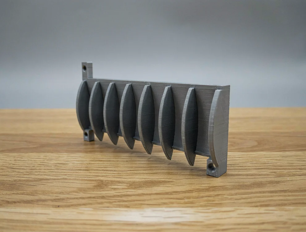 Peigne de guidage de tubes pneumatiques