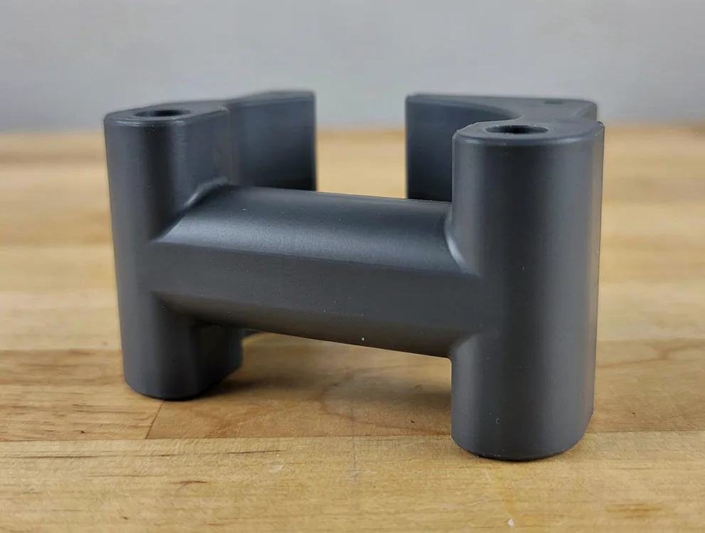 Cabinet handle with non-standard hole centres