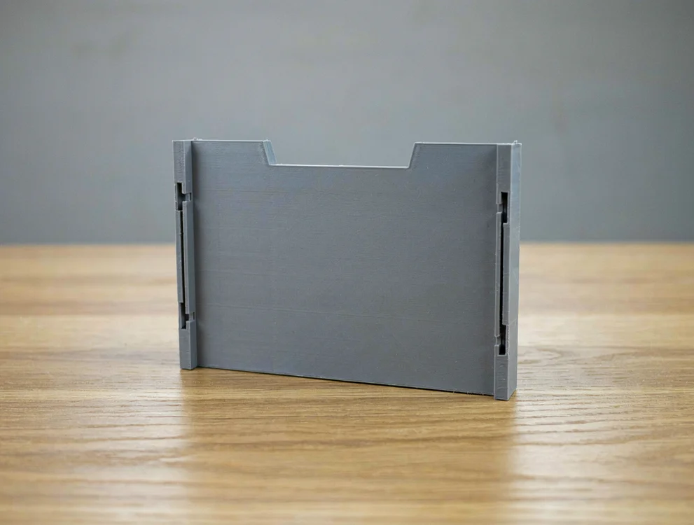 Séparateur à glissière pour bac de rangement