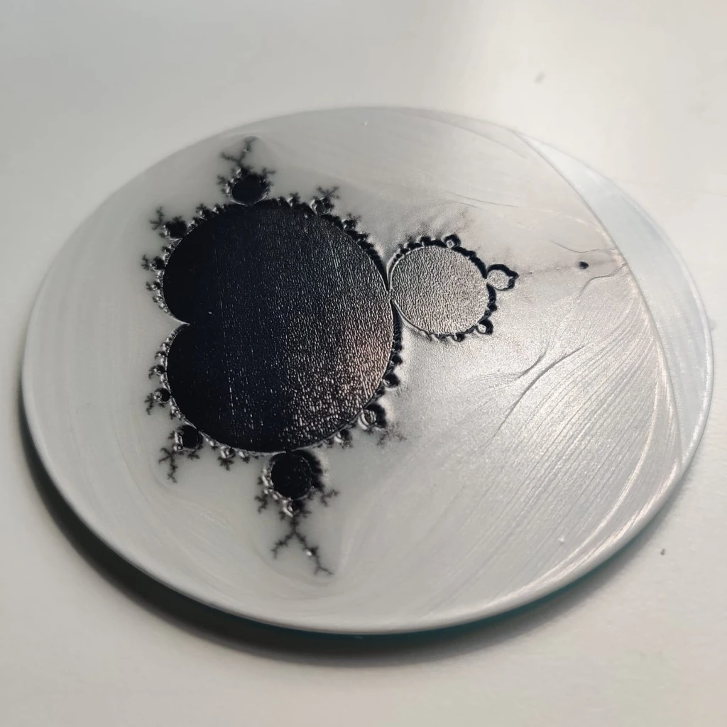 Raised Mandelbrot pattern printed on a coaster